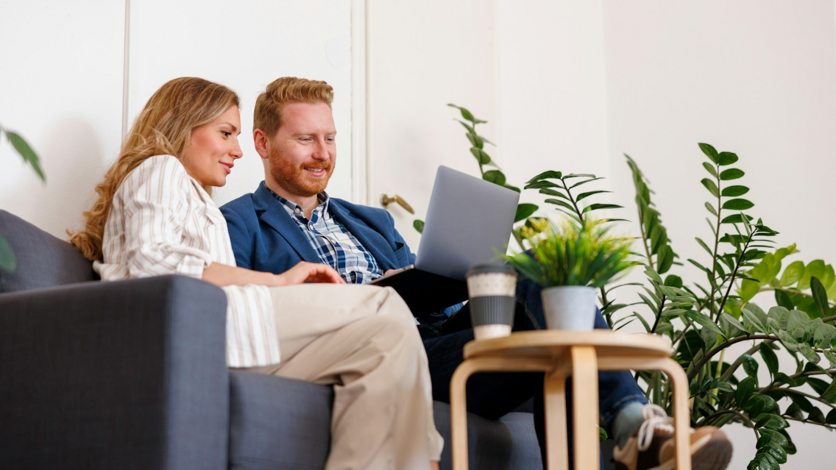 Business people working together using laptop computer