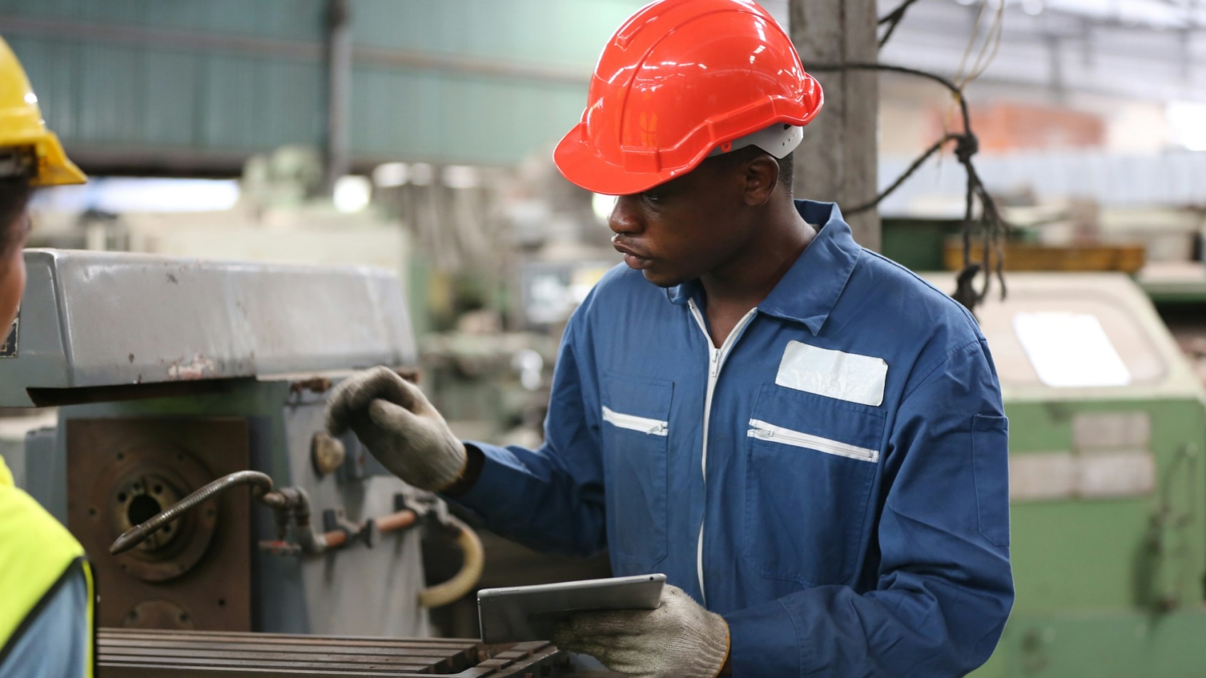 industrial factory employee working in metal manufacturing industry