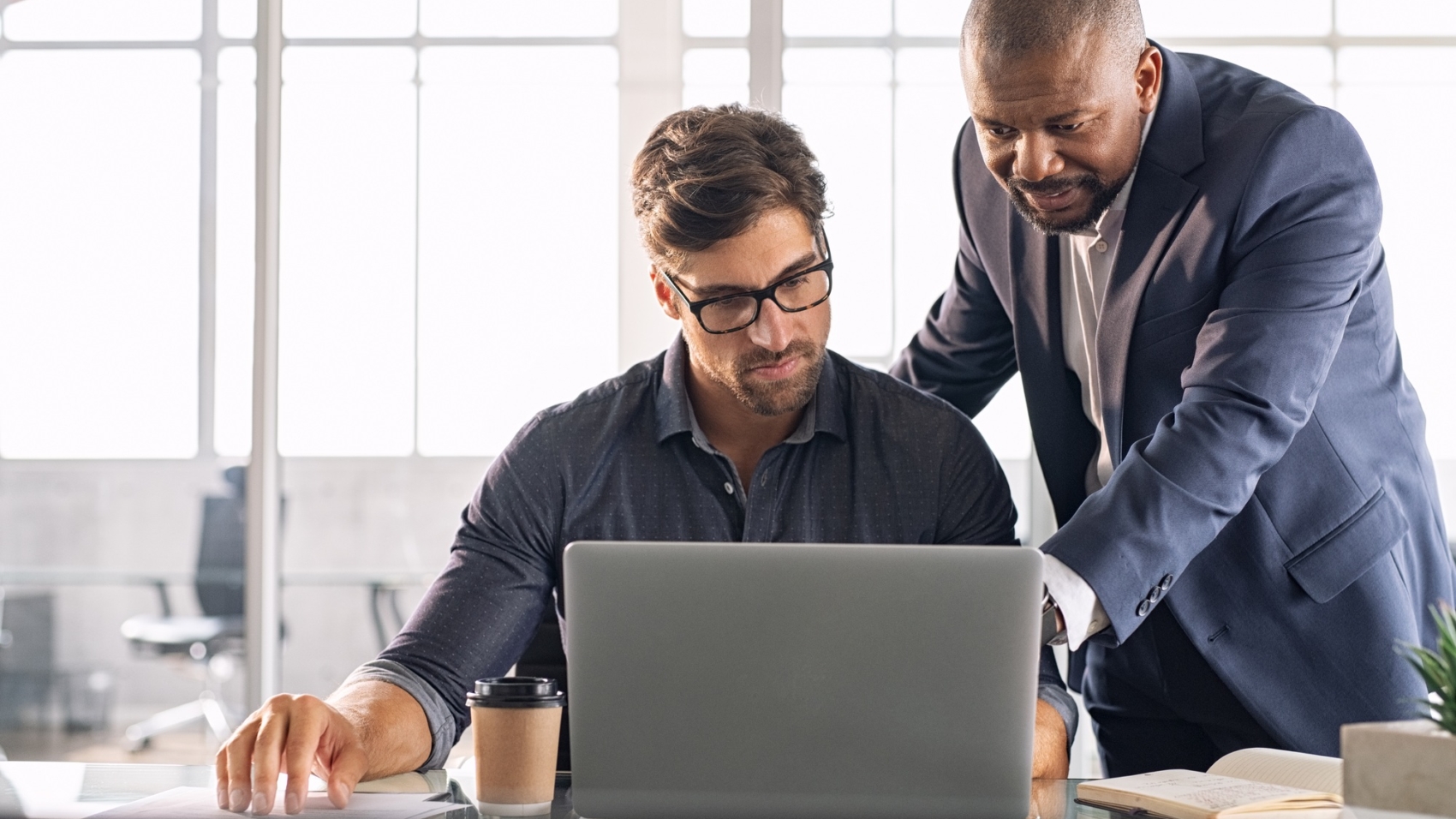 Leadership working with his employee