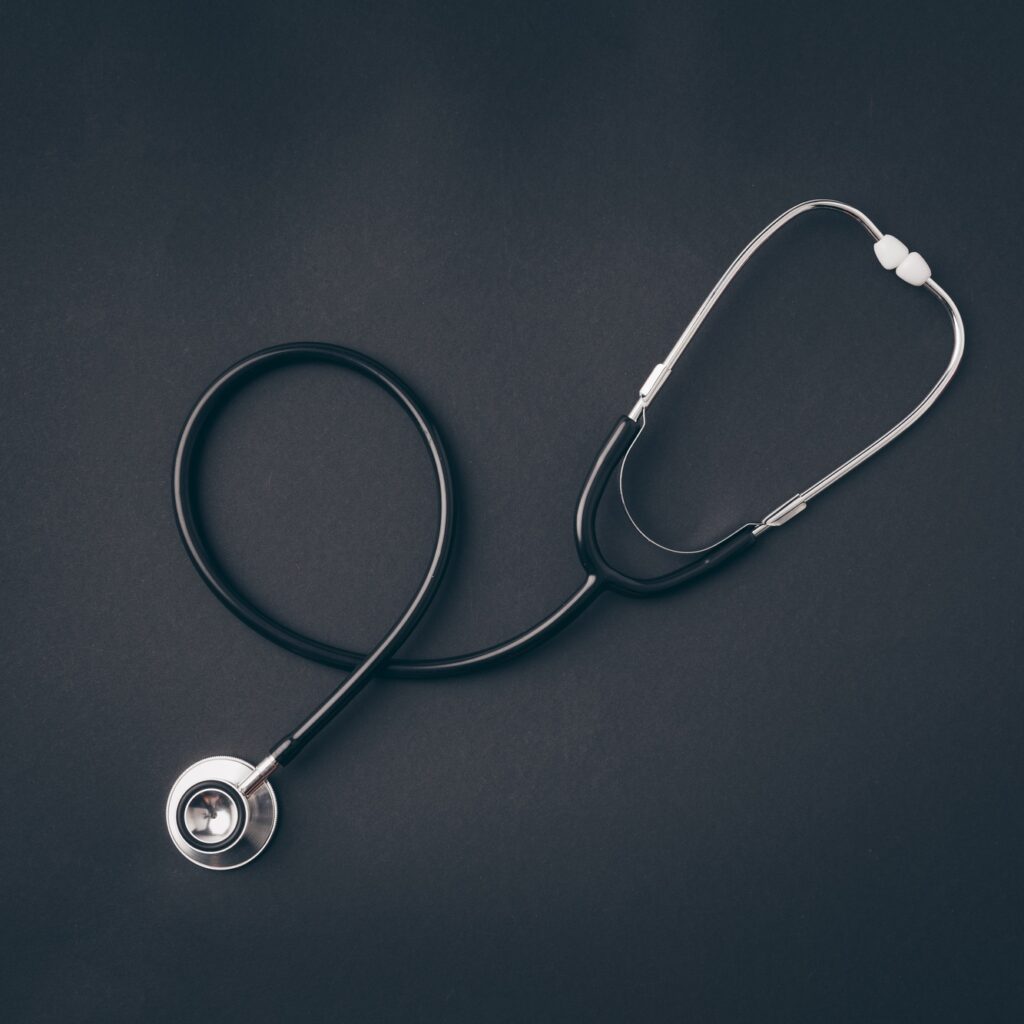 top view of stethoscope on gray surface