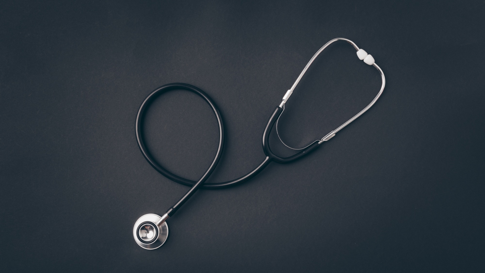 top view of stethoscope on gray surface